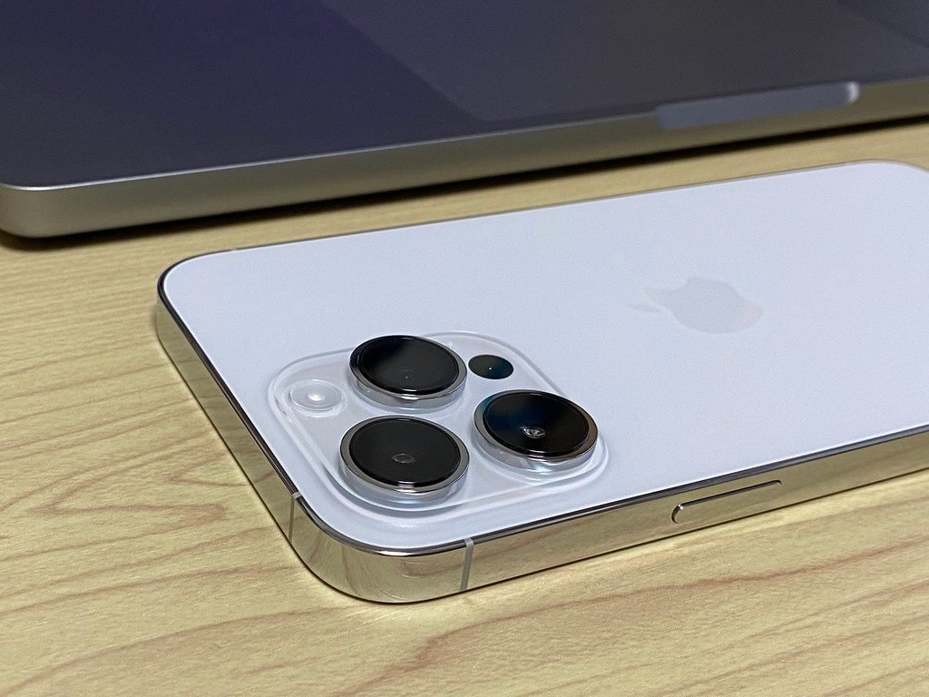 iPhone Pro Max with triple camera on a table