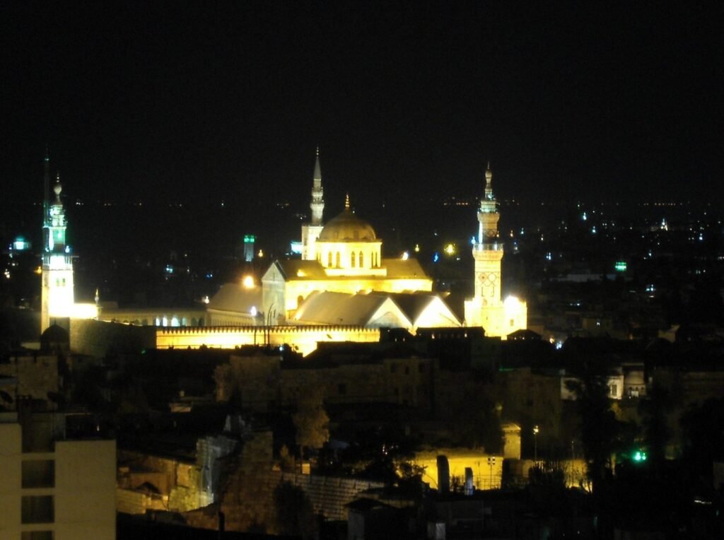 Mosque lit up at night - reciting Surah Mulk after Isha