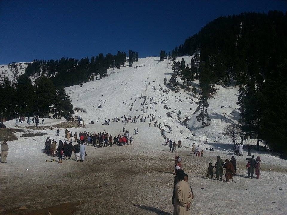 Skiers on the snowy slope at Malam Jabba ski resort, Swat